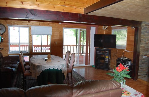 Port Albert Cottage | Cozy rustic cottage on Nine miles river, viw of Huron Lake sunset. Pet friendly