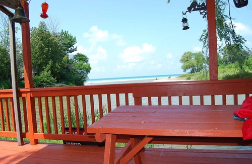 Port Albert Cottage | Cozy rustic cottage on Nine miles river, viw of Huron Lake sunset. Pet friendly