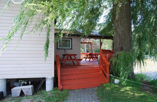 Port Albert Cottage | Cozy rustic cottage on Nine miles river, viw of Huron Lake sunset. Pet friendly