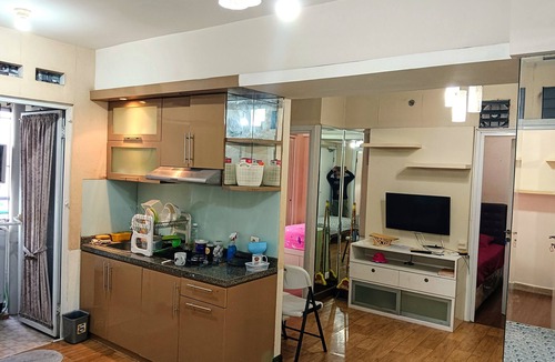 Rawasari Apartment | Expansive dual-room for the ultimate family getaway Offering a garden,