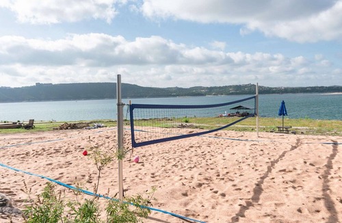 Comanche Trail House | Lakefront Home with Lake Views, Boat Dock, Sand Volleyball and Optional Bar and Game Room