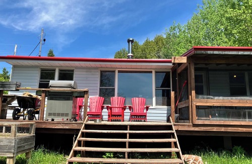 Trent Lakes Cottage | Rustic Waterfront Cottage -3 Bedroom,Sunset Views,Screened in Porch, Firepit, AC