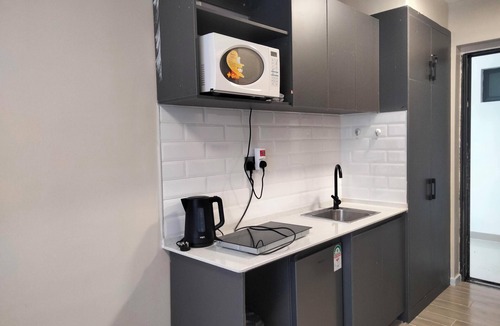 Nairobi West Apartment | Serene studio apartment in beautiful Nairobi near JKIA Airport & SGR, with WiFi