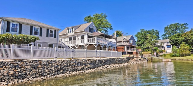 Afternoon Delight: Toast the beauty of the river from the waterfront deck in Beverly
