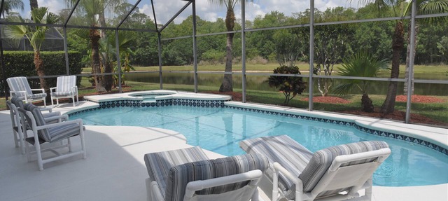 Delightful modern 4 bed, 3 bath villa with private pool/spa and lake view. in Kissimmee