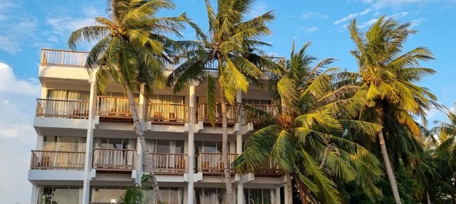 Overlooking ocean that meets cloudless sky, Coral Inn is a sanctuary of serenity in Thulusdhoo