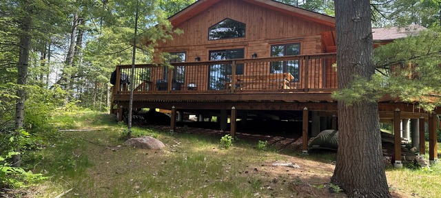 Timber cottage with large deck overlooking the water. Boat access only, no road. in Coldwater