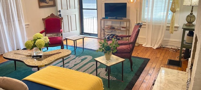 Art filled German Village House. Double lot fenced in yard with 2 car garage in Columbus